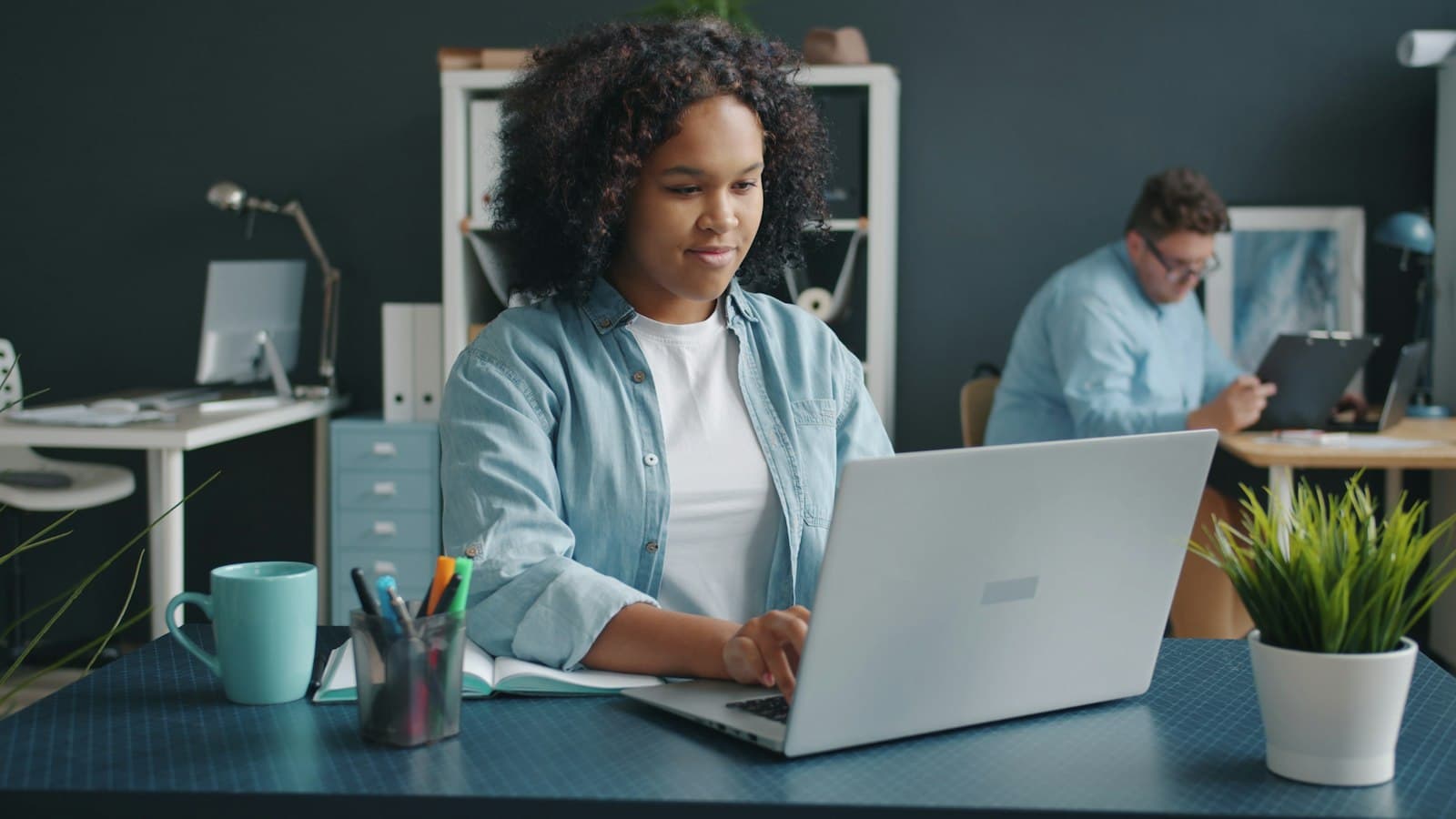 Remote support professional working in a shared office